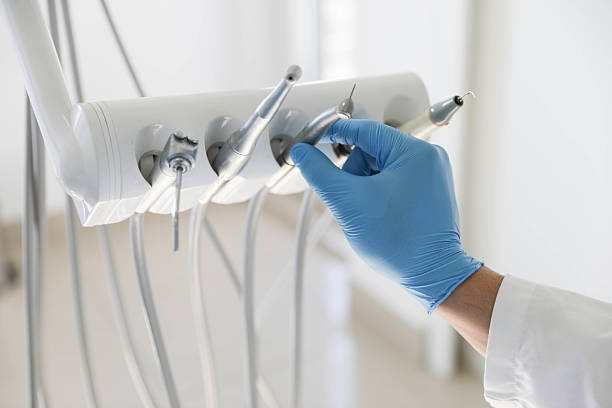 Professional Tooth Extraction technician working in Washington, NC